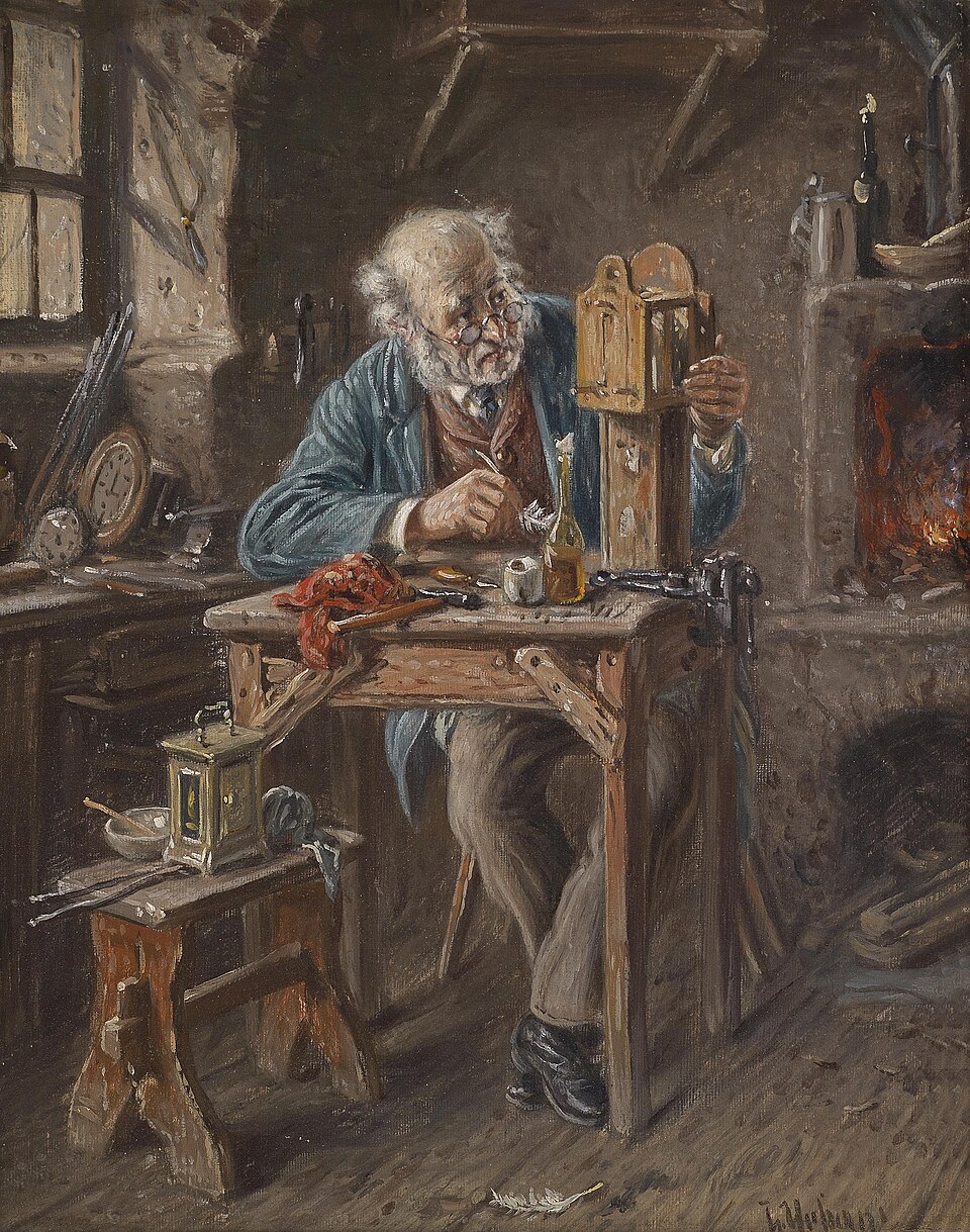 An oil painting of an elderly watchmaker alone in his workshop, spectacles down his nose, holding a clock movement up to the light from a small window while a tool rests in his other hand. Files, a loupe and finished movements cover the bench; a fire burns in the hearth behind him.